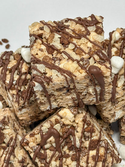 Custom chocolate cocoa pebbles rice crispy treat with personalized fondant topper